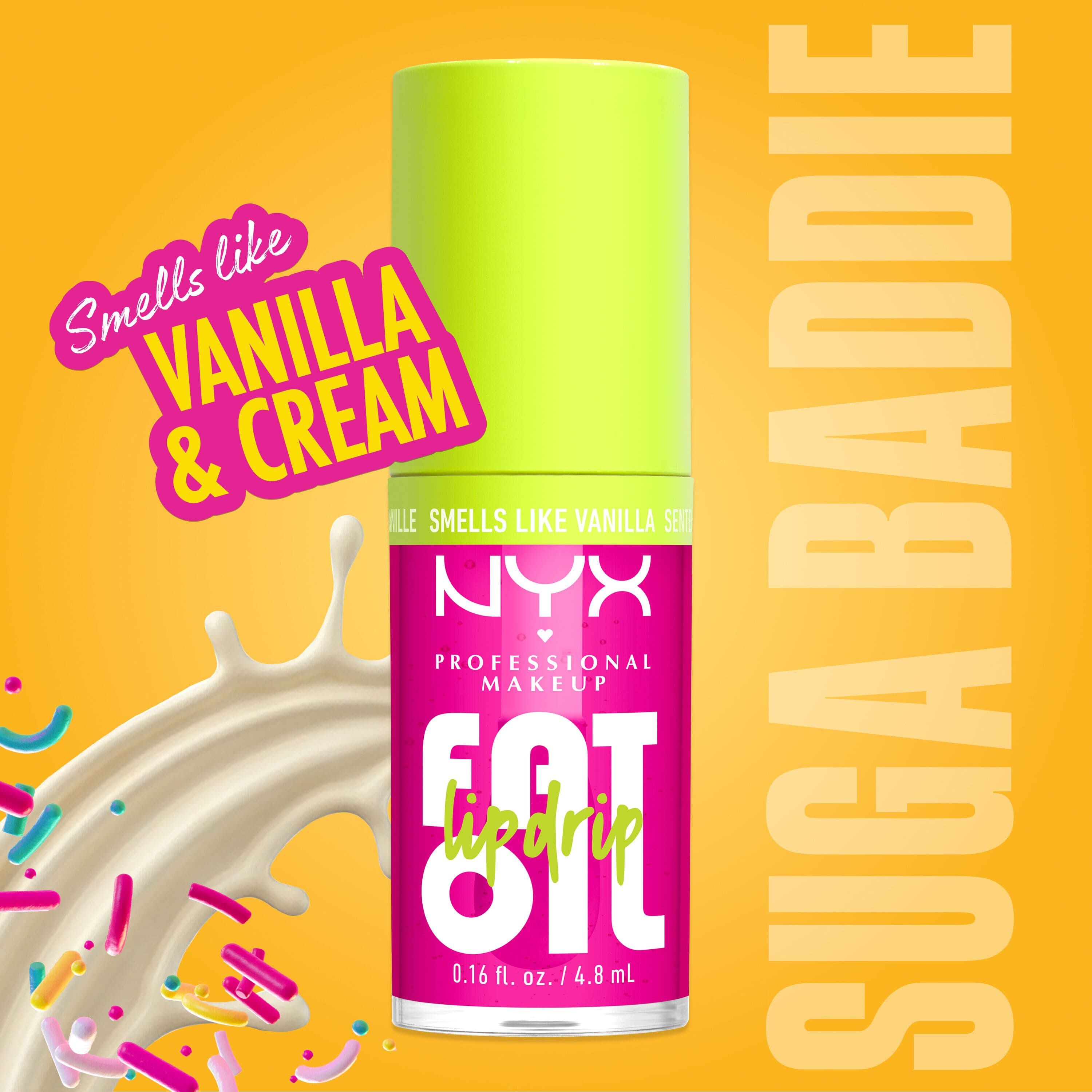 NYX Professional Makeup Fat Oil Lip Drip lip gloss in bright pink packaging with lime green cap, vanilla cream scent callout, and creamy splash with colorful sprinkles on yellow background.