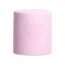 The Marshmellow Makeup Face Blender. A small pink sponge in the form of a cylinder with a carved out heart in the middle. 