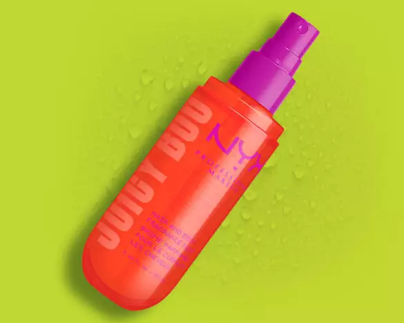 NYX Professional Makeup Hair & Body Fragrance Mist in Juicy Boo with a textured oil behind the packshot.