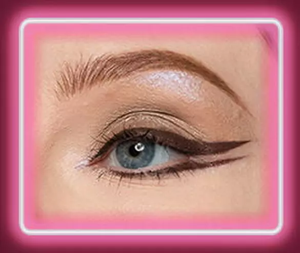Close-up of an eye with NYX Professional Makeup Lid Lingerie Cream Eye Pigment in 06 Mocha Mesh used to line and define the eye
