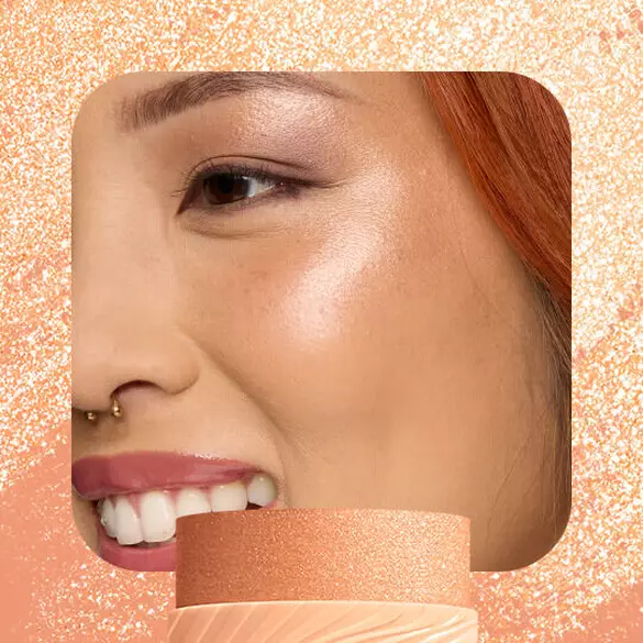 Model with champagne highlight wearing NYX Buttermelt Stix in 08 LET ME MELT shimmer
