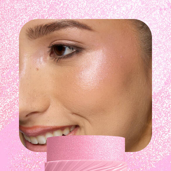 Model with radiant pink highlight wearing NYX Buttermelt Stix in My Melt Era 04 showing luminous shimmer finish