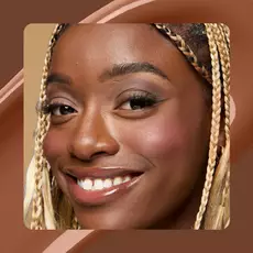 Close-up of model wearing Wonder Snatch(TM) Concealer in Shade27 Walnut.