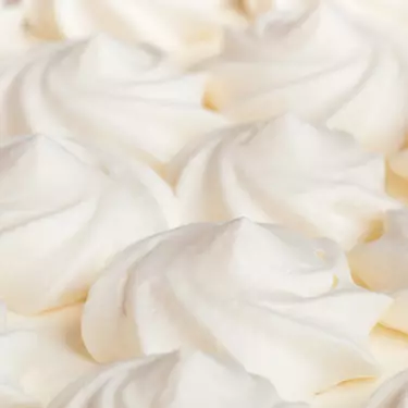 Suga Baddie scent top notes are whipped cream texture, representing top notes of whipped cream, powdered sugar, and sparkling bergamot.