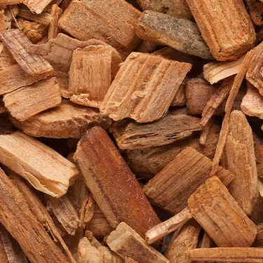NYX Professional Makeup Caramelt Mami scent bottom notes are of cedarwood chips illustrating bottom notes of liquid amber, soft cedarwood, and edenolide.