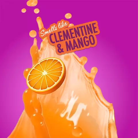 Splash of orange liquid with a clementine slice and "Smells like Clementine & Mango" text on a pink background, representing NYX Juicy Boo fragrance.