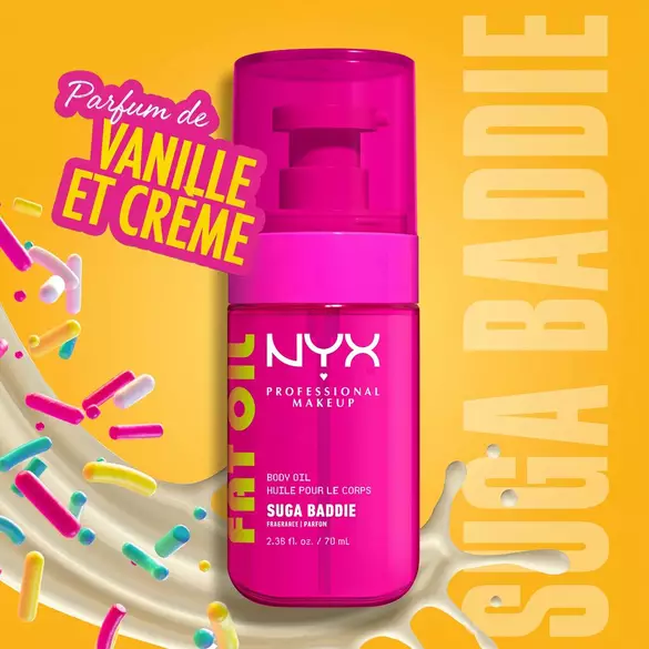 NYX Professional Makeup Fat Oil Body Oil in Suga Baddie scent, bright pink bottle, with vanilla cream swirl and colorful sprinkles, labeled as smelling like vanilla and cream, on a yellow background.